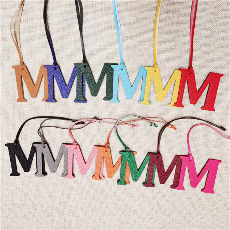 XMESSUN พวงกุญแจหนังแท้รูปตัวอ - Monogram Keychain Leather บทวิจารณ์และราคา