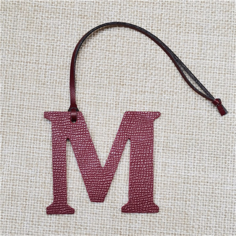 XMESSUN พวงกุญแจหนังแท้รูปตัวอ - Monogram Keychain Leather บทวิจารณ์และราคา