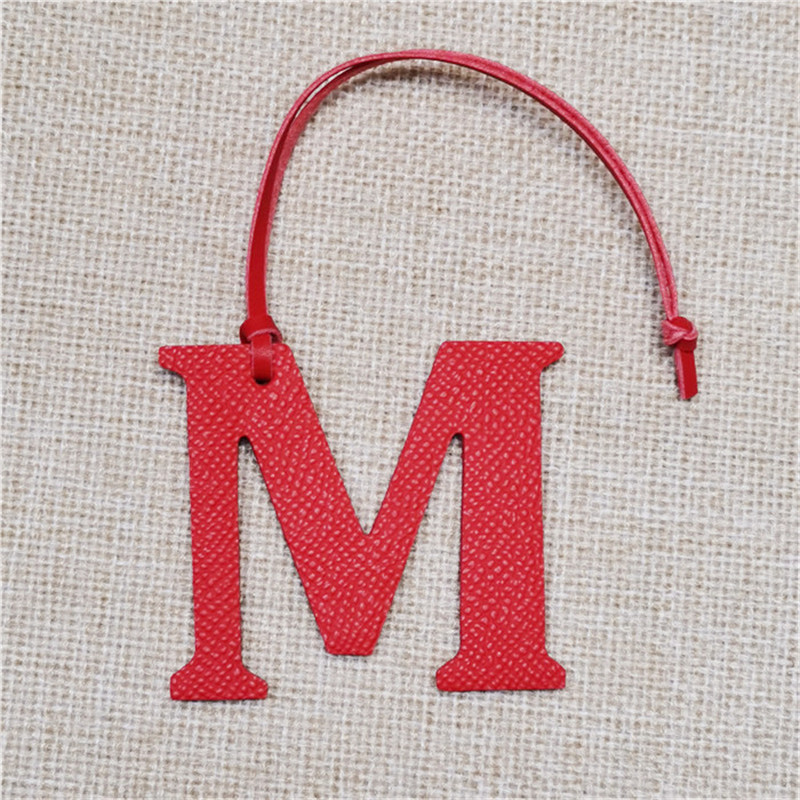XMESSUN พวงกุญแจหนังแท้รูปตัวอ - Monogram Keychain Leather บทวิจารณ์และราคา